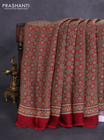 Modal silk saree maroon with allover ajrakh prints and simple border