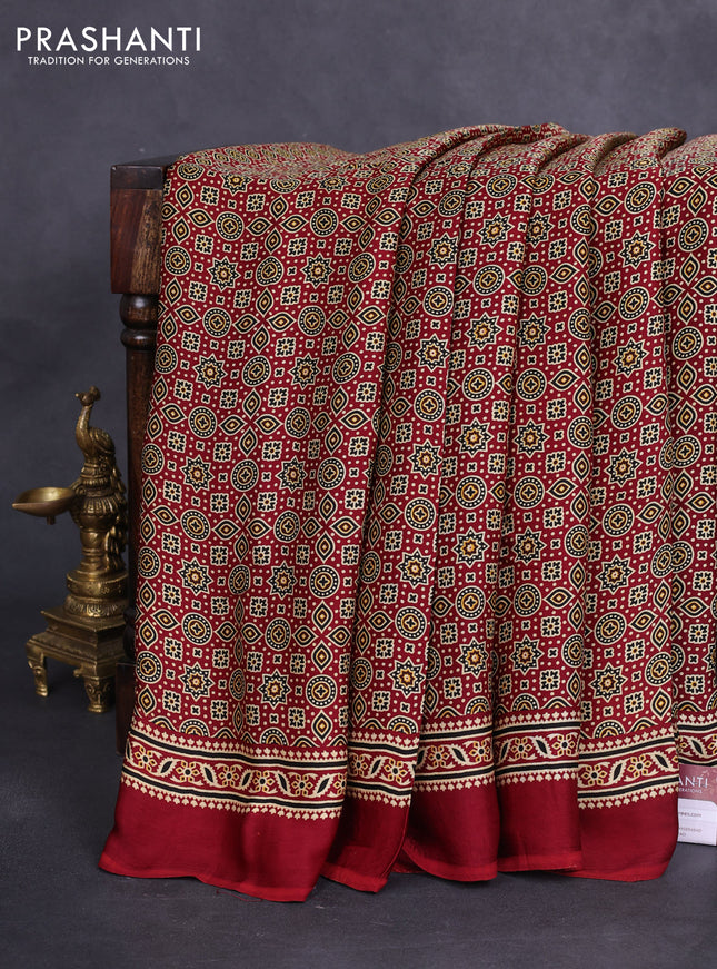 Modal silk saree maroon with allover ajrakh prints and simple border