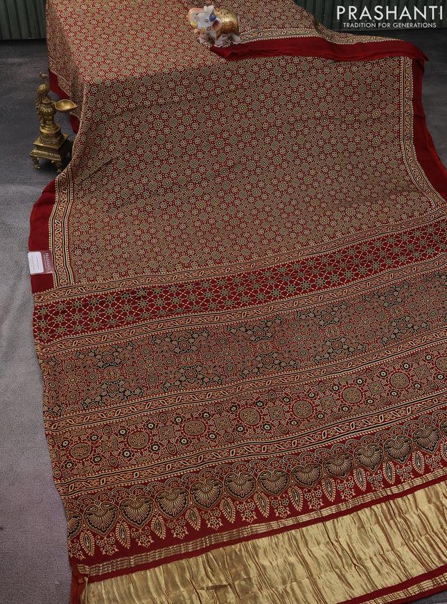 Modal silk saree maroon with allover ajrakh prints and simple border