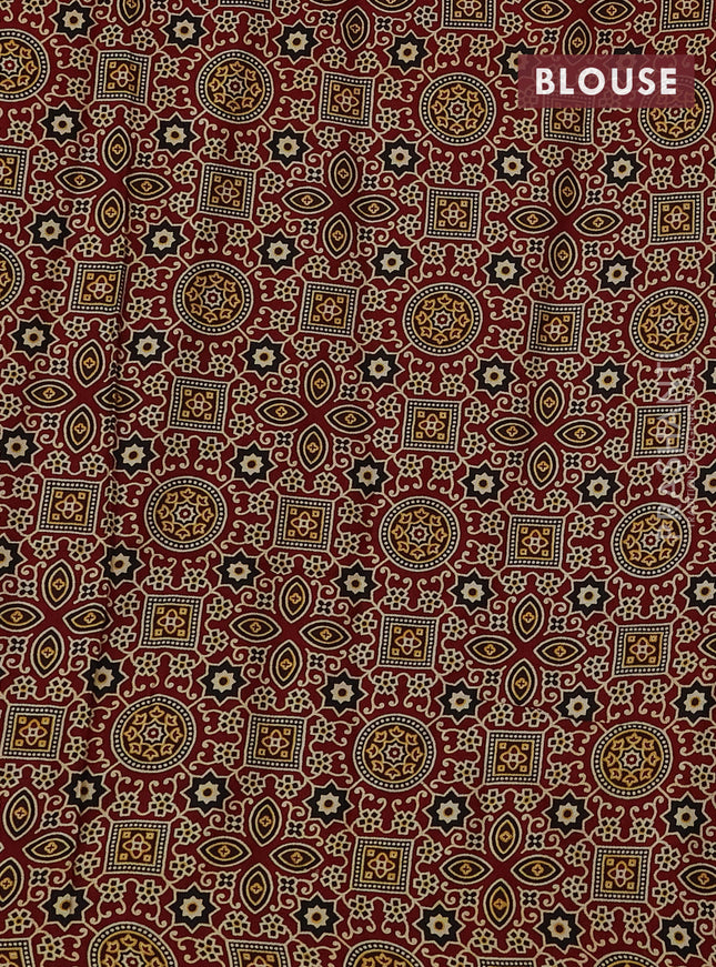 Modal silk saree maroon with allover ajrakh prints and simple border