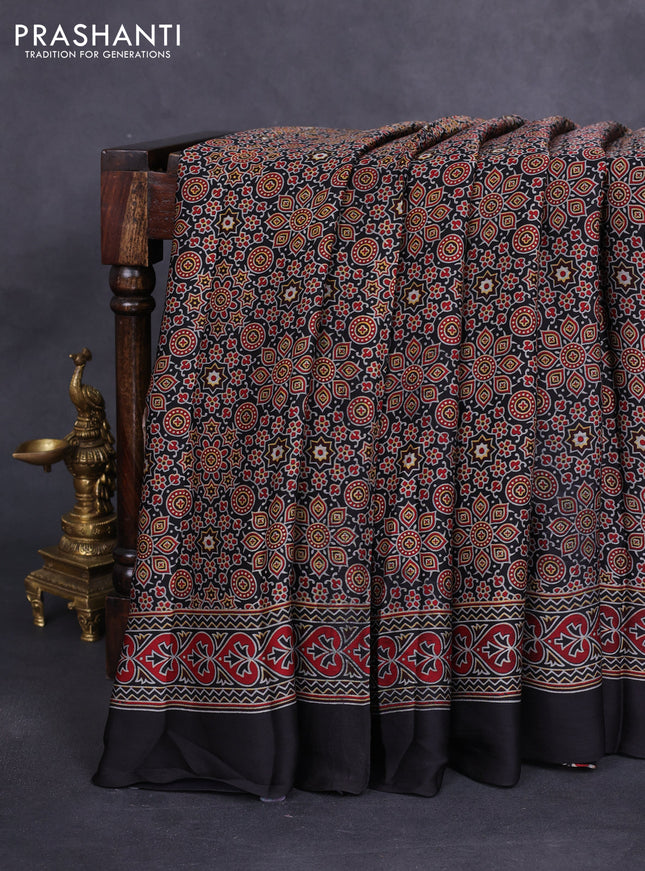 Modal silk saree black with allover ajrakh prints and simple border
