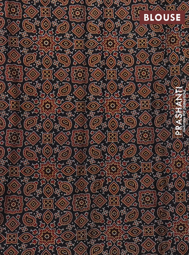 Modal silk saree black with allover ajrakh prints and simple border