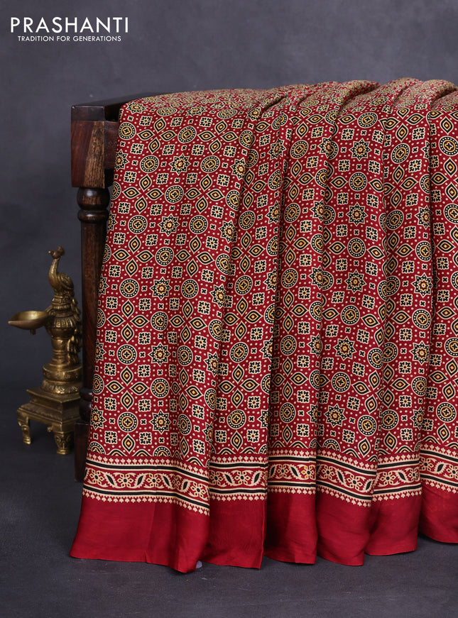Modal silk saree maroon with allover ajrakh prints and simple border