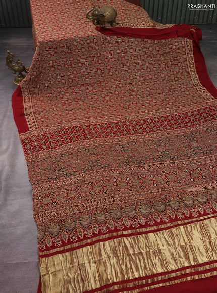 Modal silk saree maroon with allover ajrakh prints and simple border
