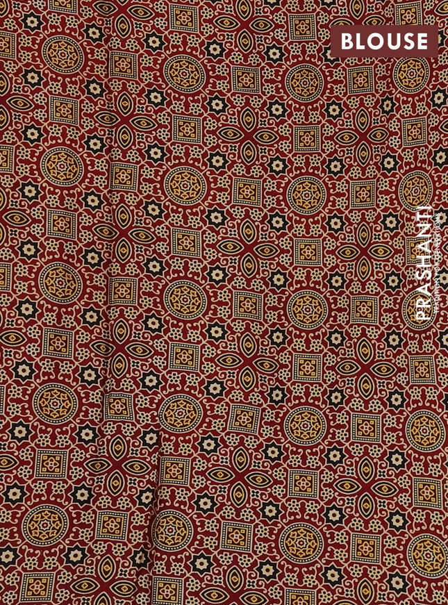 Modal silk saree maroon with allover ajrakh prints and simple border