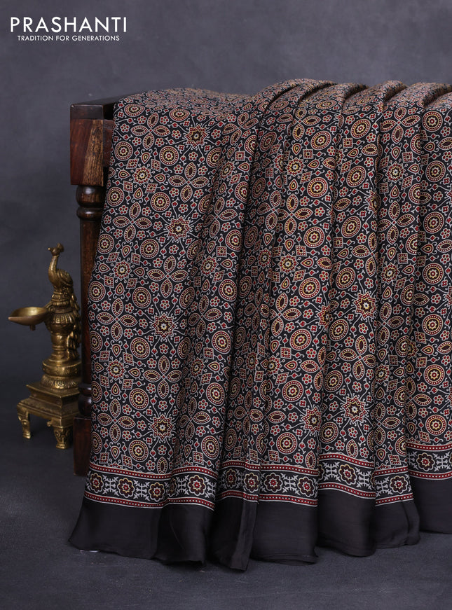 Modal silk saree black with allover ajrakh prints and simple border