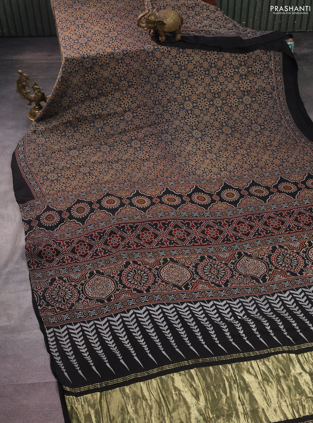 Modal silk saree black with allover ajrakh prints and simple border