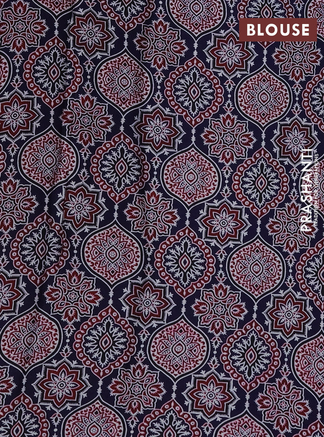 Modal silk saree blue with allover ajrakh prints and simple border