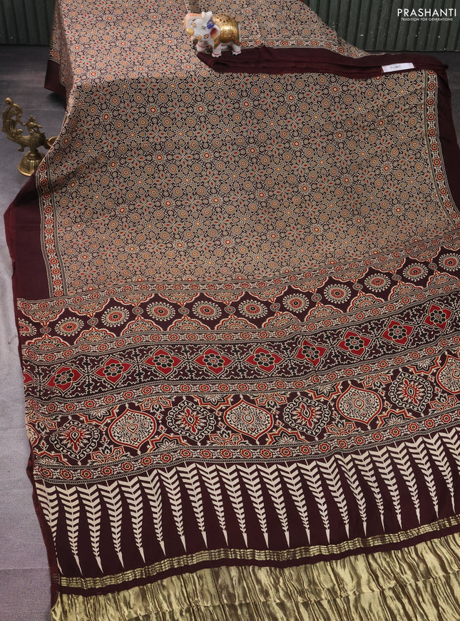 Modal silk saree coffee brown with allover ajrakh prints and simple border