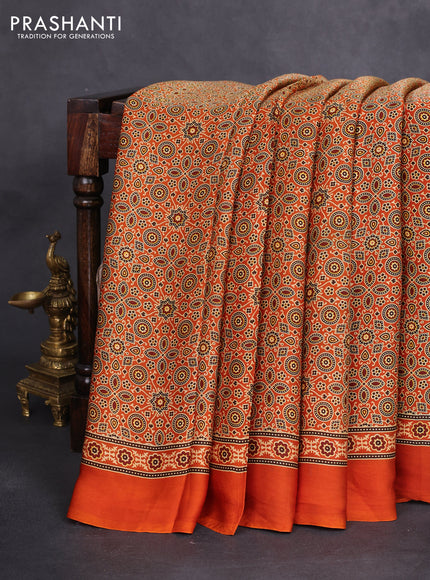 Modal silk saree orange with allover ajrakh prints and simple border
