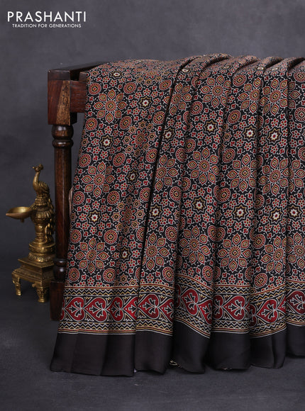 Modal silk saree black with allover ajrakh prints and printed border