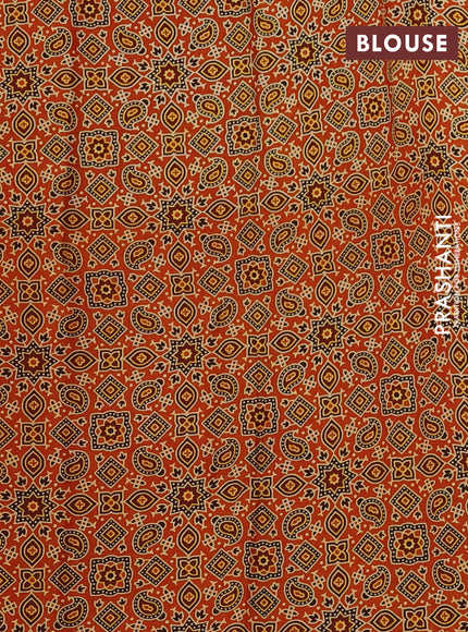 Modal silk saree orange with allover ajrakh prints and printed border