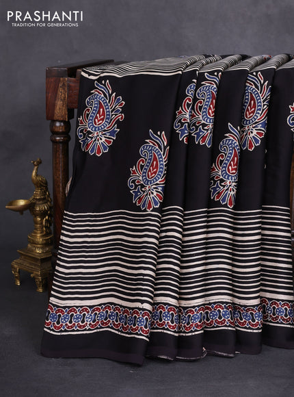 Modal silk saree black with ajrakh butta prints and printed border