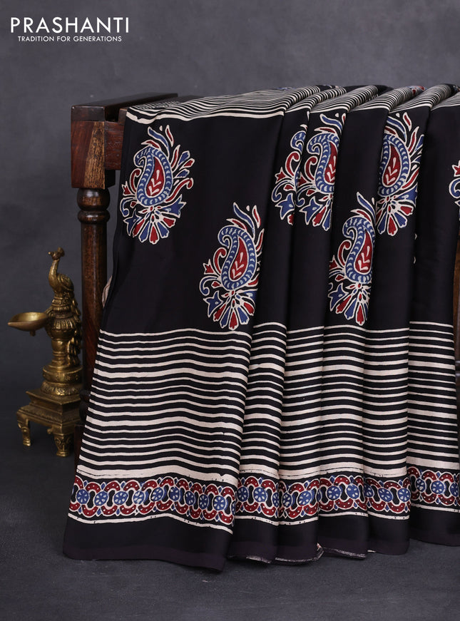 Modal silk saree black with ajrakh butta prints and printed border