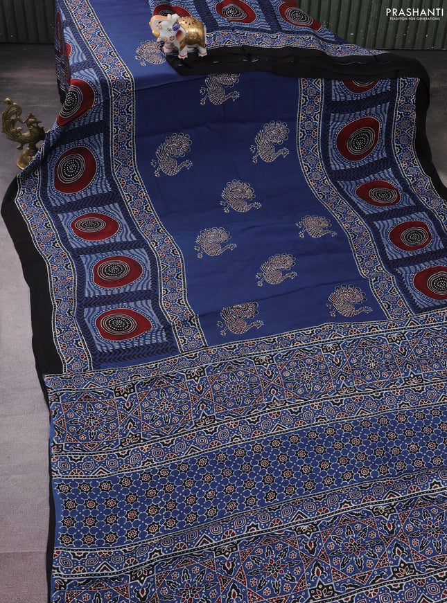 Modal silk saree blue and black with ajrakh butta prints and printed border