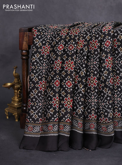 Modal silk saree black with allover ajrakh prints and printed border