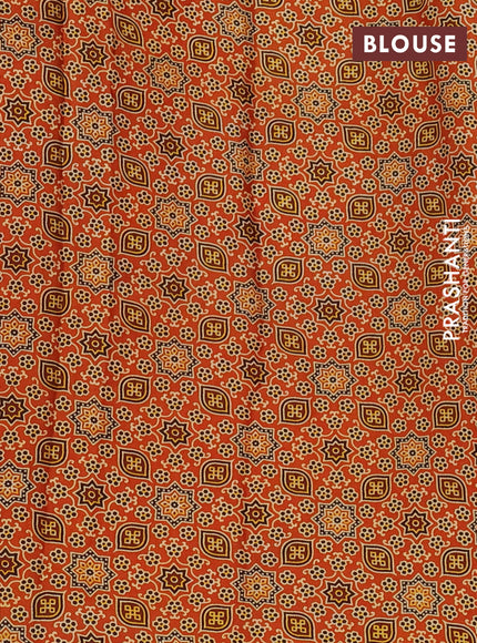 Modal silk saree orange with allover ajrakh prints and printed border