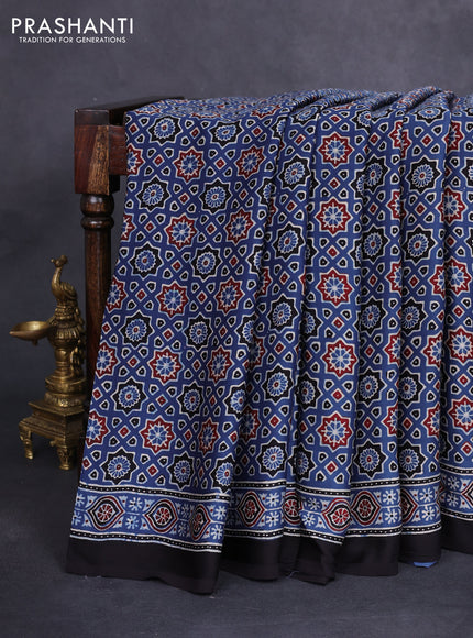 Modal silk saree blue and black with allover ajrakh prints and printed border