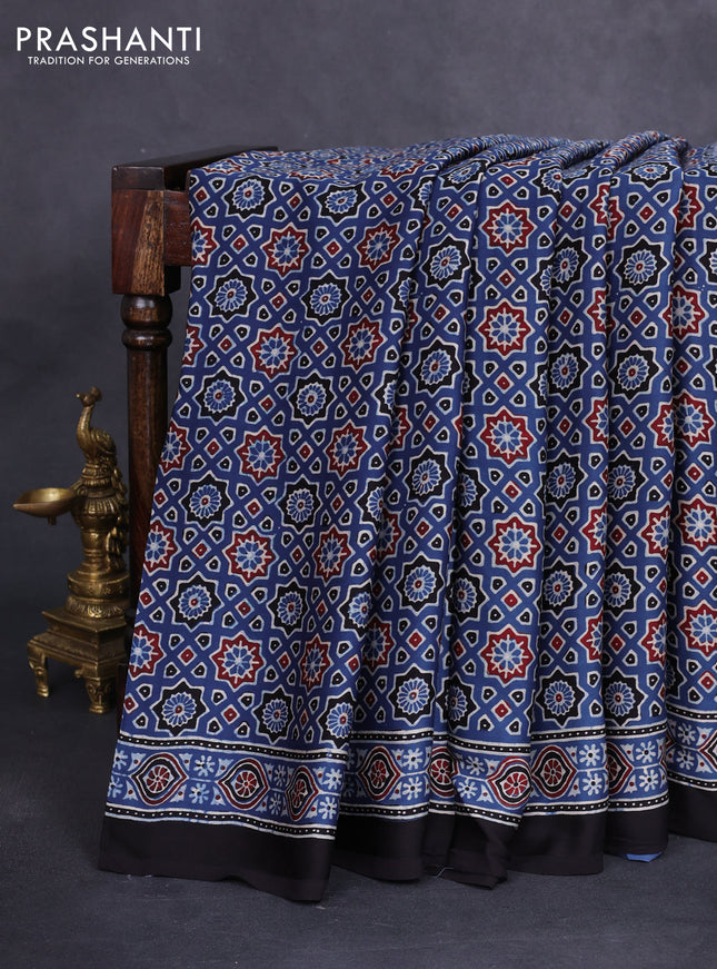 Modal silk saree blue and black with allover ajrakh prints and printed border