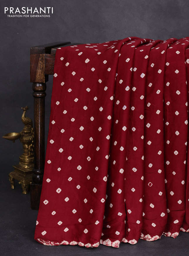 Modal silk saree maroon and navy blue with allover bandhini prints and ajrakh printed pallu & blouse