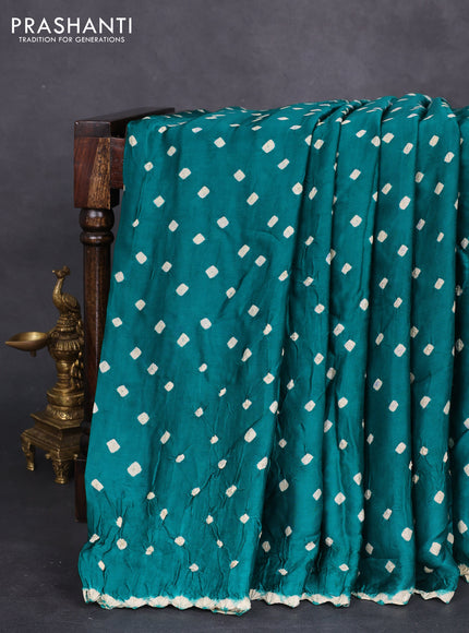 Modal silk saree green and black with allover bandhini prints and ajrakh printed pallu & blouse