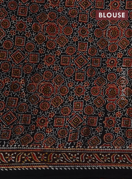 Modal silk saree green and black with allover bandhini prints and ajrakh printed pallu & blouse