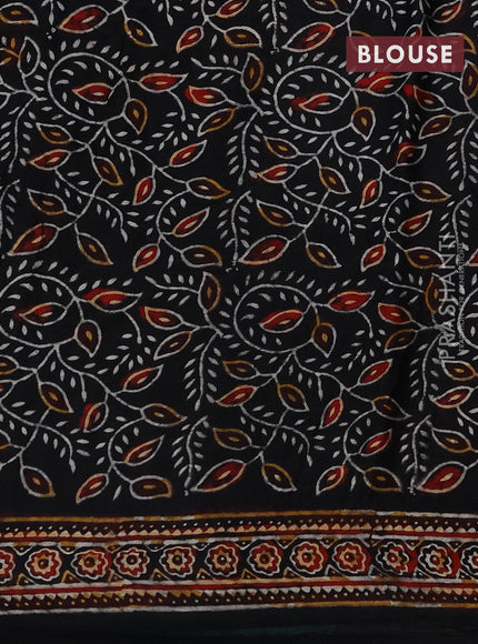 Modal silk saree teal green shade and black with allover bandhini prints and ajrakh printed pallu & blouse