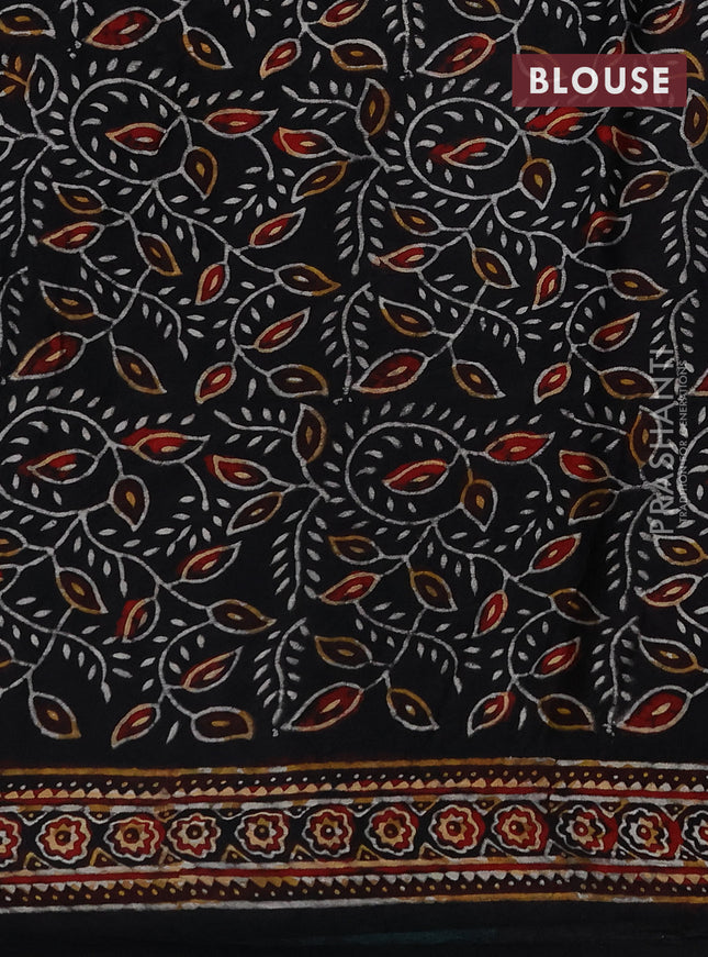 Modal silk saree teal green shade and black with allover bandhini prints and ajrakh printed pallu & blouse