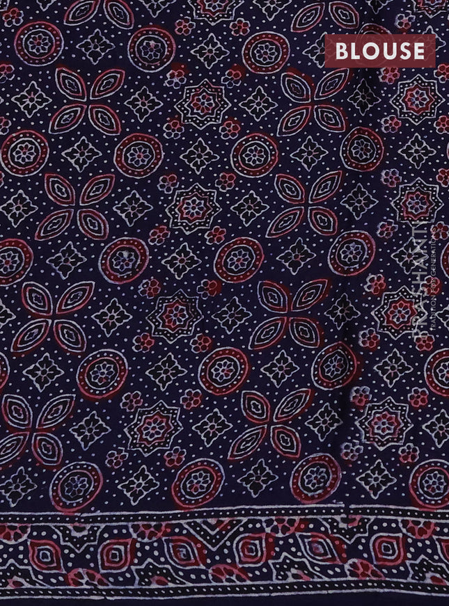 Modal silk saree peach shade and navy blue with allover bandhini prints and ajrakh printed pallu & blouse