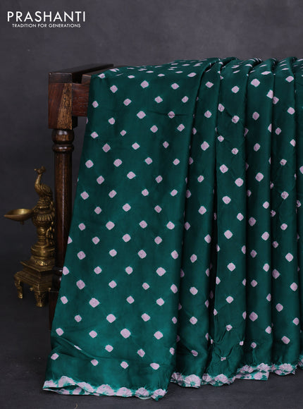 Modal silk saree teal green and black with allover bandhini prints and ajrakh printed pallu & blouse