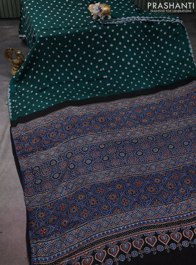 Modal silk saree teal green and black with allover bandhini prints and ajrakh printed pallu & blouse