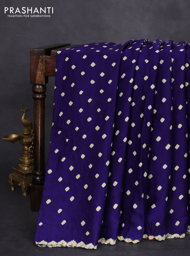 Modal silk saree blue and maroon with allover bandhini prints and ajrakh printed pallu & blouse