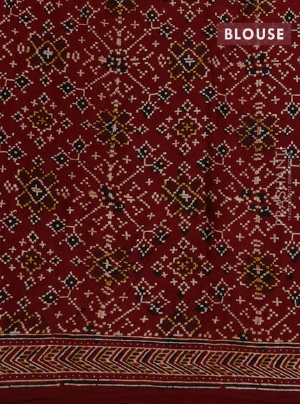 Modal silk saree blue and maroon with allover bandhini prints and ajrakh printed pallu & blouse