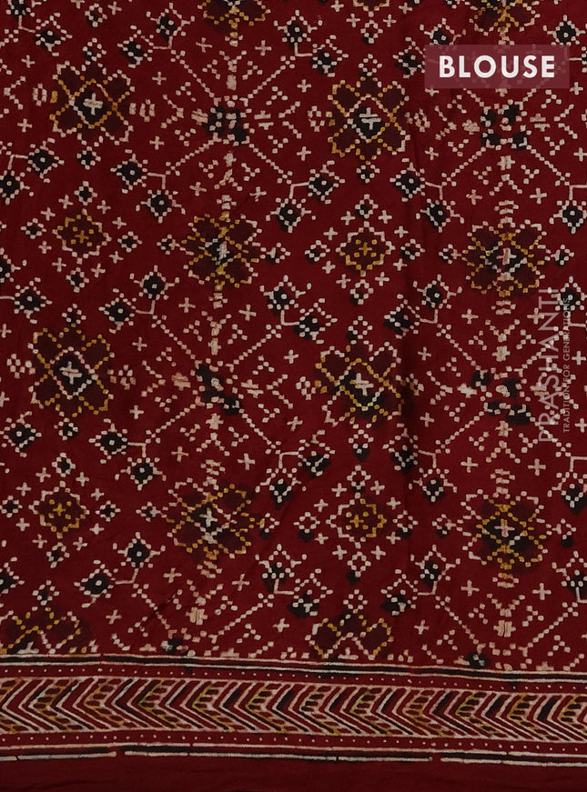 Modal silk saree blue and maroon with allover bandhini prints and ajrakh printed pallu & blouse