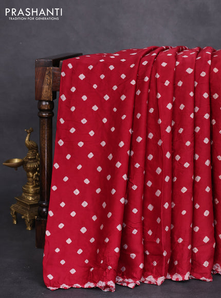 Modal silk saree maroon and black with allover bandhini prints and ajrakh printed pallu & blouse