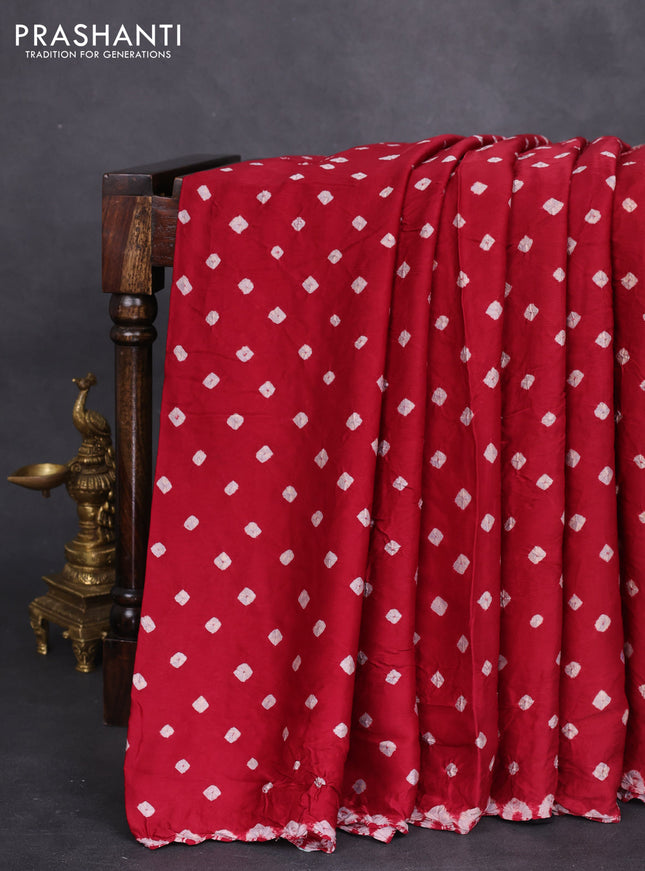 Modal silk saree maroon and black with allover bandhini prints and ajrakh printed pallu & blouse