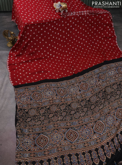 Modal silk saree maroon and black with allover bandhini prints and ajrakh printed pallu & blouse