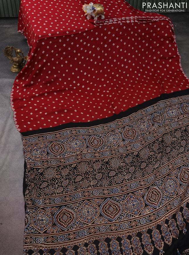 Modal silk saree maroon and black with allover bandhini prints and ajrakh printed pallu & blouse