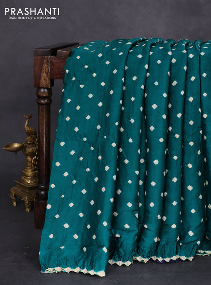 Modal silk saree green and black with allover bandhini prints and ajrakh printed pallu & blouse