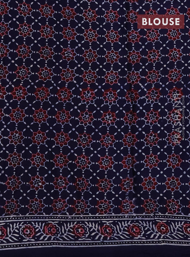 Modal silk saree green and black with allover bandhini prints and ajrakh printed pallu & blouse