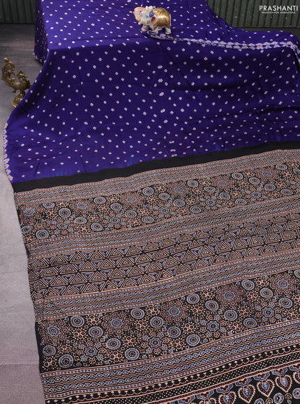 Modal silk saree blue and black with allover bandhini prints and ajrakh printed pallu & blouse