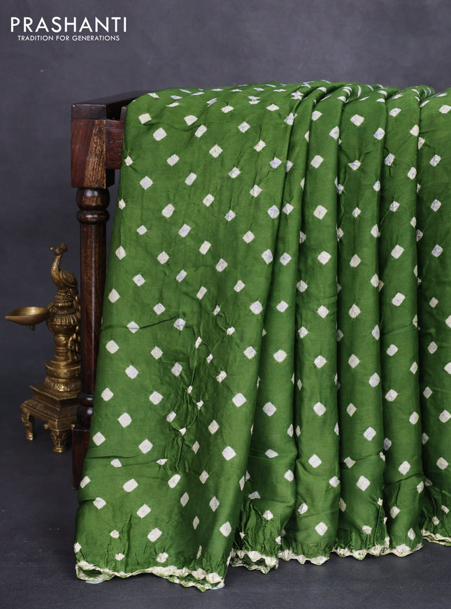 Modal silk saree mehendi green and orange with allover bandhini prints and ajrakh printed pallu & blouse