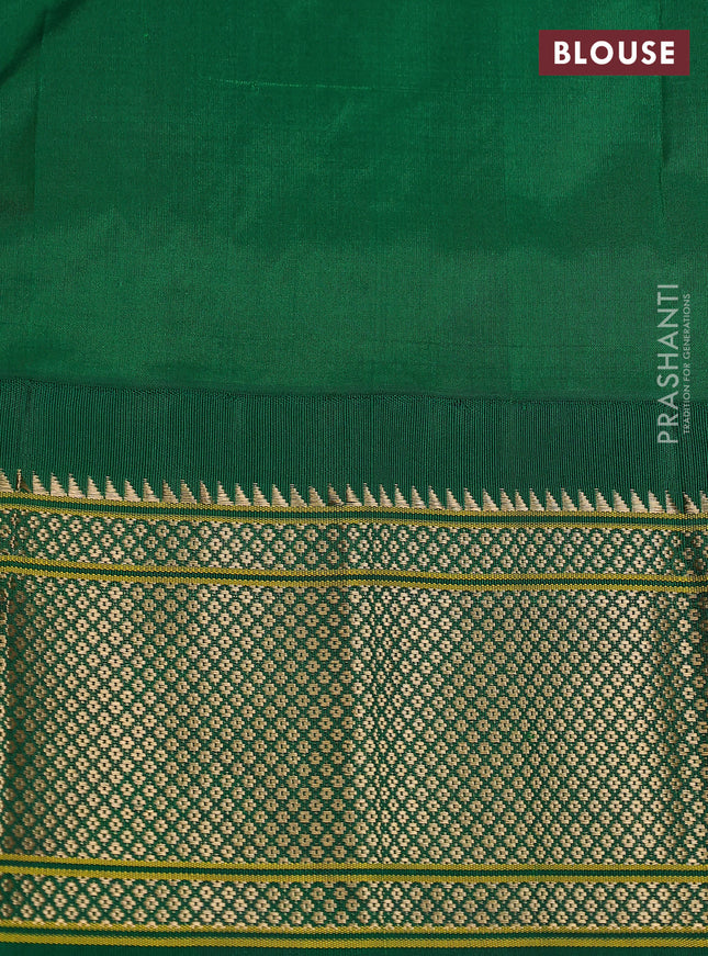 Pure paithani silk saree pink and green with allover zari woven buttas and paithani weaving pallu
