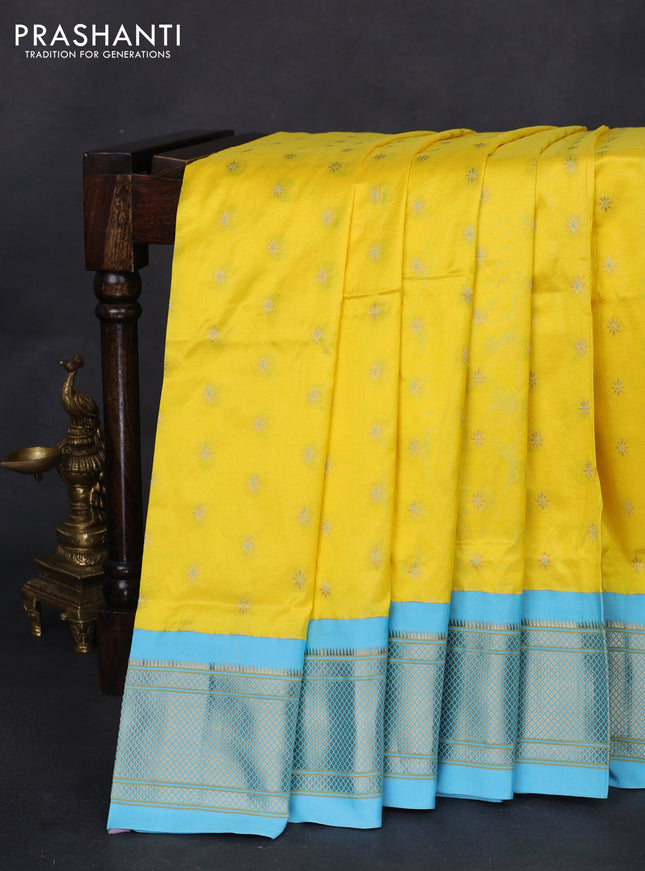Pure paithani silk saree yellow and light blue with allover zari woven buttas and paithani weaving pallu
