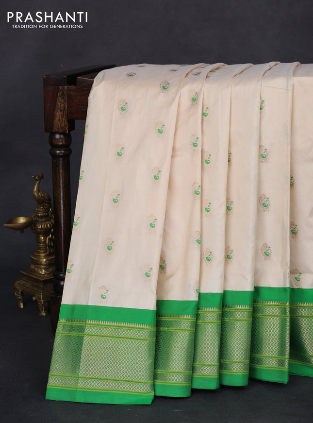 Pure paithani silk saree cream and green with allover zari woven annam buttas and paithani weaving pallu