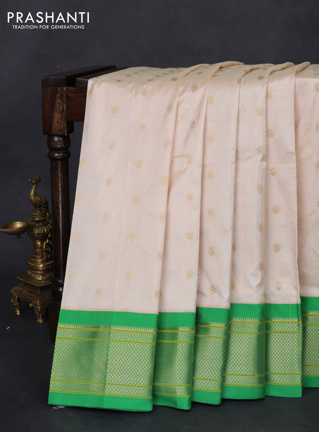 Pure paithani silk saree cream and green with allover zari woven buttas and paithani weaving pallu