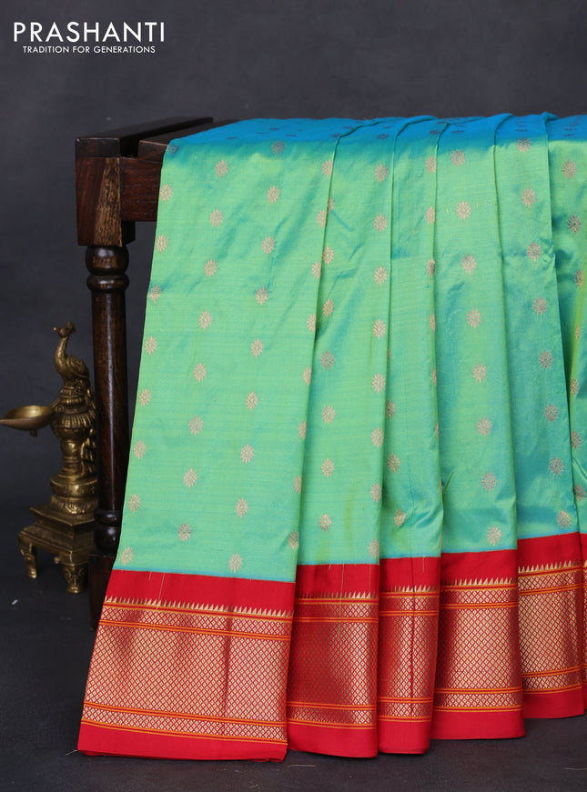 Pure paithani silk saree dual shade of teal green and red with allover zari woven floral buttas and paithani weaving pallu
