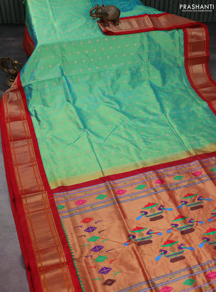 Pure paithani silk saree dual shade of teal green and red with allover zari woven floral buttas and paithani weaving pallu