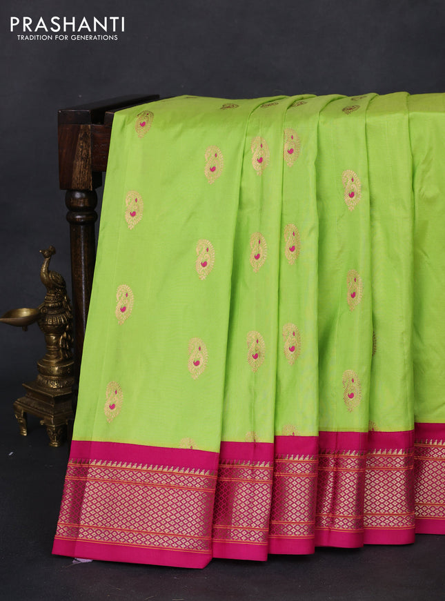 Pure paithani silk saree fluorescent green and pink with allover zari woven paisley buttas and paithani weaving pallu