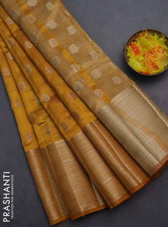 Semi raw silk saree mustard yellow with allover zari woven 1000 buttas and long zari woven border
